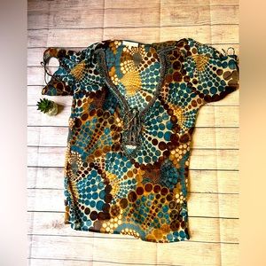 SOLITAIRE S sheer beaded blouse.